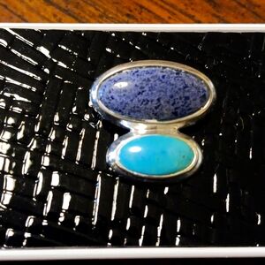 Natural stone and sterling silver slide.